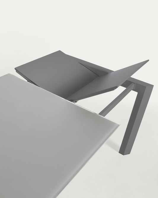 Taula extensible Axis de vidre gris i potes d'acer acabat gris fosc 140 (200) cm