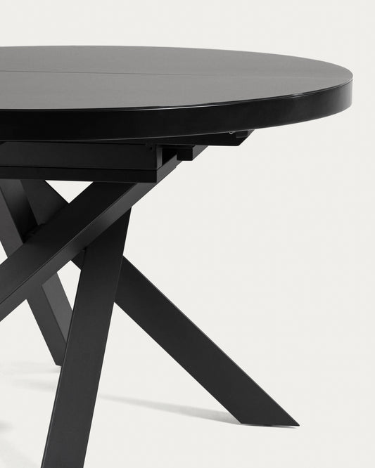 Taula extensible rodona Vashti de cristall i potes d'acer acabat negre Ø 120 (160) cm