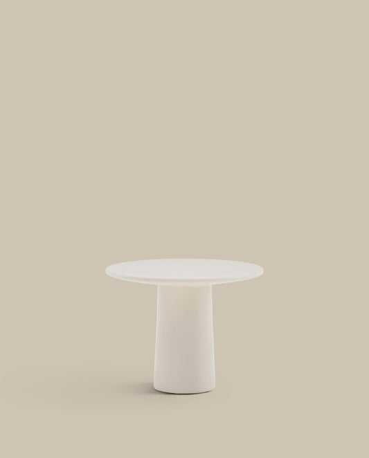 Taula de centre Albanella de ciment amb acabat blanc brillant Ø65 cm