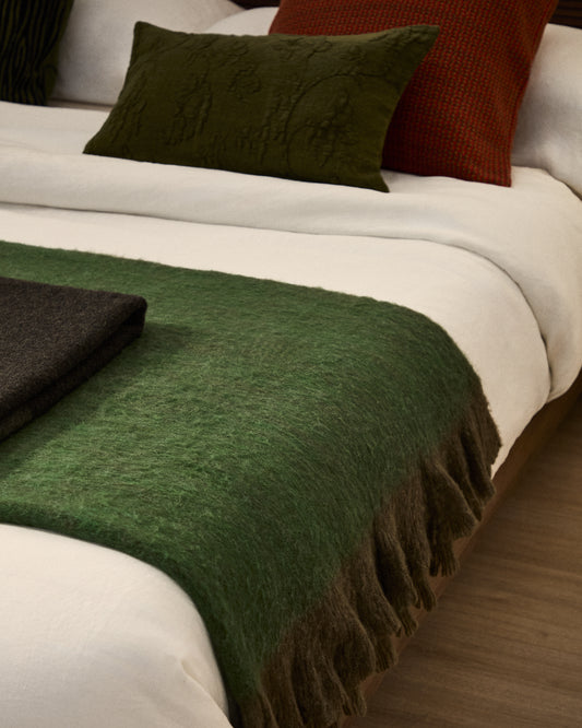 Manta Odelna de llana i acrílic amb volants verda 130 x 170 cm