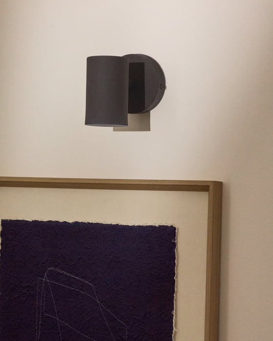 Aplic de paret Manie de metall amb acabat efecte ferro colat negre