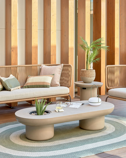 Taula de centre d'exterior Taimi de ciment Ø 140 x 60 cm