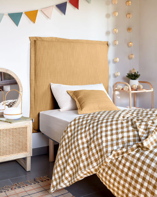 Cabecero desenfundable Tanit de lino mostaza para cama de hasta 90 cm