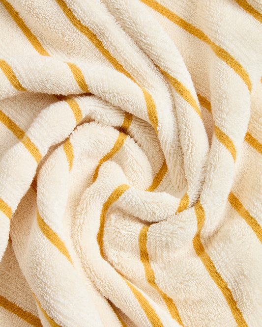 Tovallola Dorane 100 % cotó amb ratlles grogues 50 x 90 cm